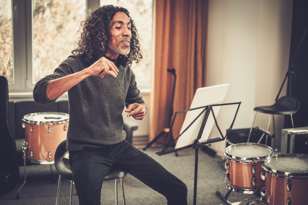 Happy music teacher music creates passion