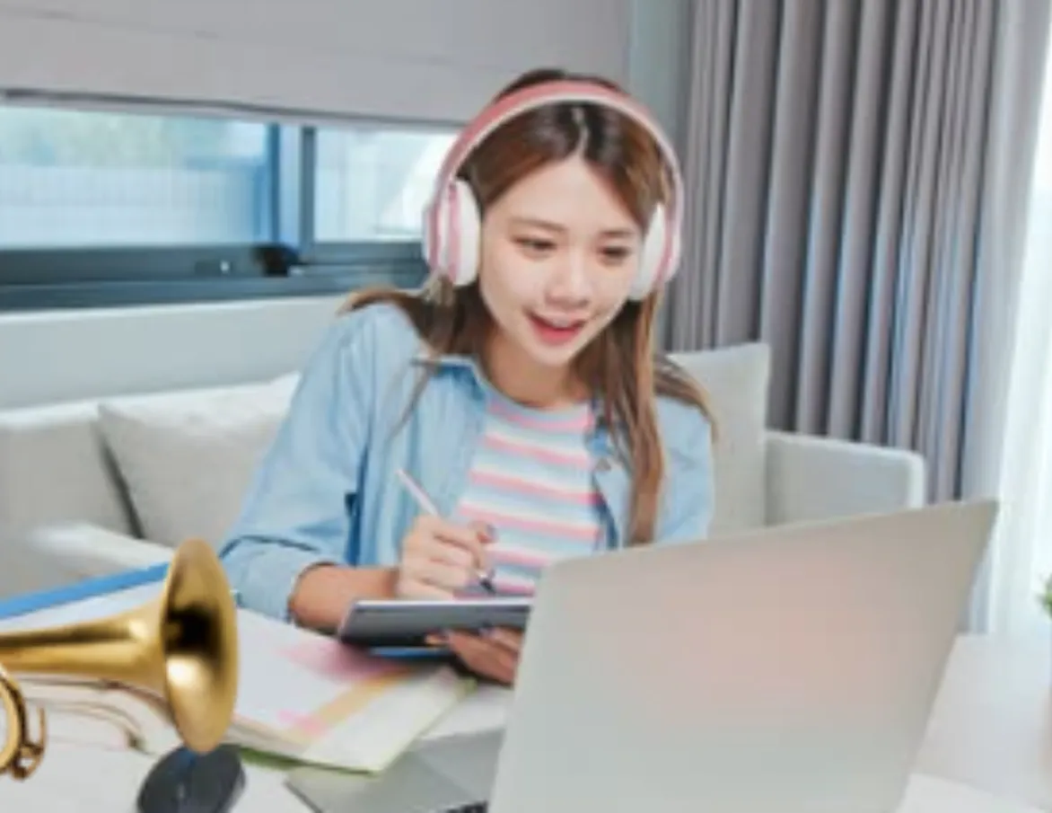child engrossed in an online music lesson key benefits of online music lessons for children,