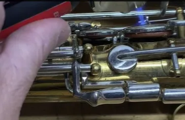 saxophone pad replacement process, instrument repair